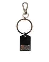 Porte-clés Dolce &amp; Gabbana en verre synthétique noir avec plaque métallique DG Logo.