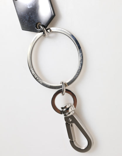 Porte-clés Dolce & Gabbana en verre synthétique noir avec plaque métallique DG Logo.