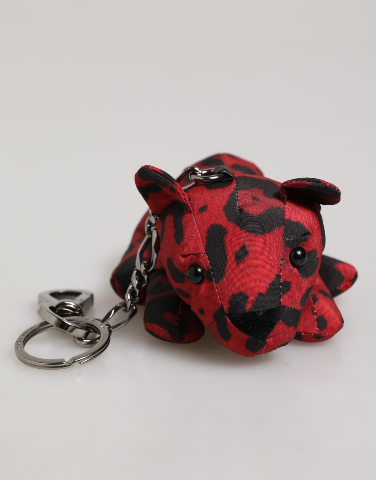 Porte-clés Dolce &amp; Gabbana en polyester rouge et noir avec silhouette d'animal.