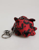 Porte-clés Dolce &amp; Gabbana en polyester rouge et noir avec silhouette d'animal.
