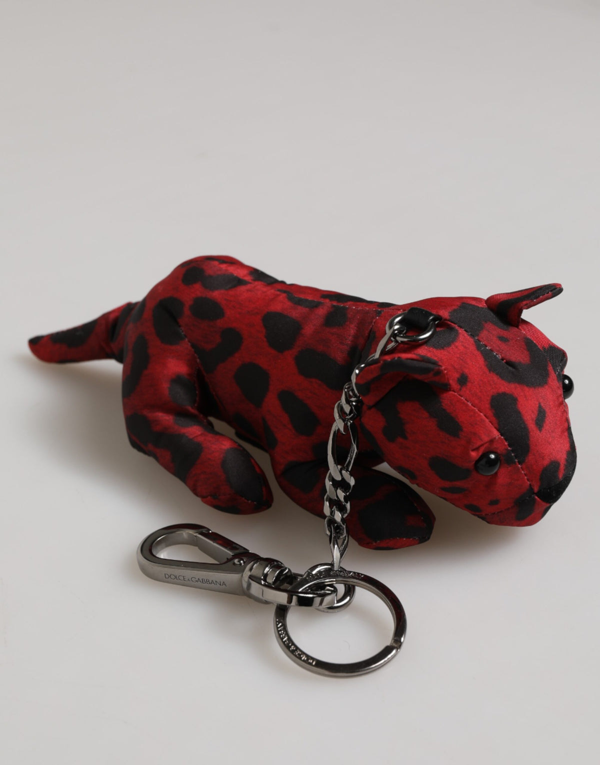 Porte-clés Dolce &amp; Gabbana en polyester rouge et noir avec silhouette d'animal.