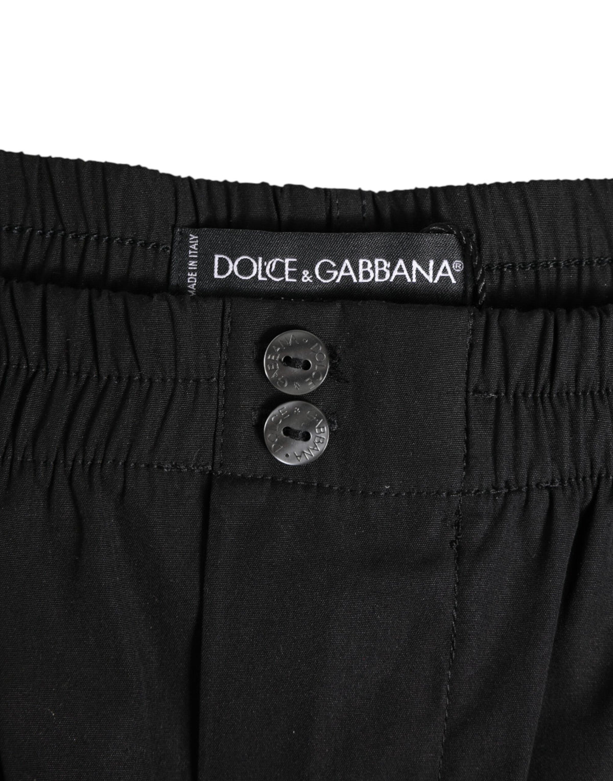 Maillot de bain Dolce &amp; Gabbana en coton noir avec taille élastique et boutons.