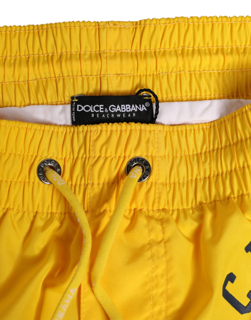 Short de bain boxer pour homme Dolce &amp; Gabbana en nylon jaune avec imprimé du logo.
