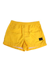 Short de bain boxer Dolce &amp; Gabbana en nylon jaune avec plaque logo.