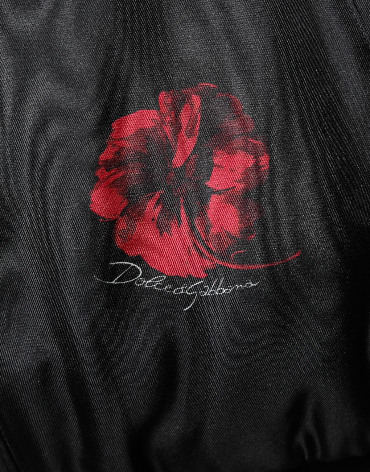 Bomber en soie à motifs floraux rouges et noirs de Dolce & Gabbana