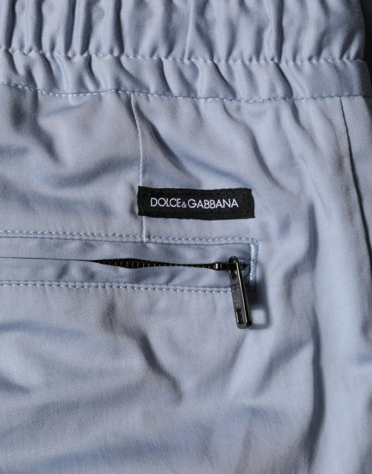 Pantalon homme Dolce &amp; Gabbana en coton bleu clair, taille élastique avec cordon.