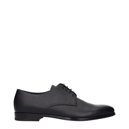 Prada, souliers Oxford et mocassins en cuir noir