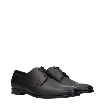 Prada, souliers Oxford et mocassins en cuir noir