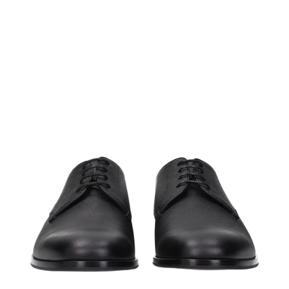 Prada, souliers Oxford et mocassins en cuir noir