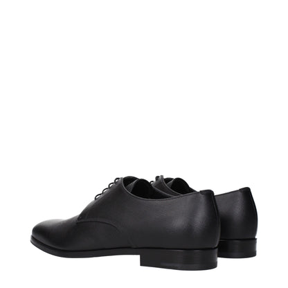 Prada, souliers Oxford et mocassins en cuir noir