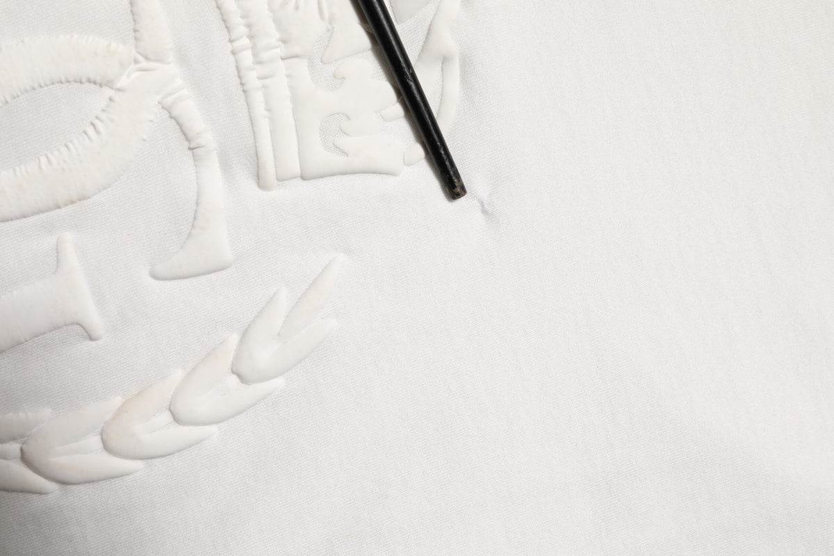T-shirt homme en coton blanc Dolce &amp; Gabbana avec logo DG en relief.