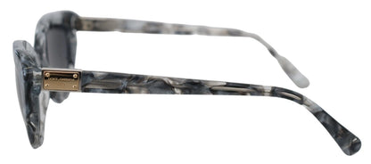 Lunettes de soleil Dolce & Gabbana DG4194, forme œil de chat, en acétate gris, avec plaque logo.