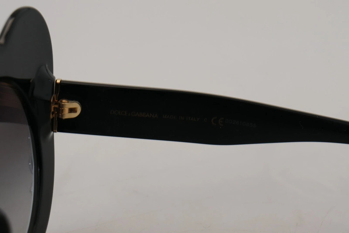 Lunettes de soleil Dolce & Gabbana DG4325BM en acétate blanc et noir, avec cristaux.