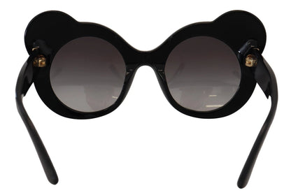 Lunettes de soleil Dolce & Gabbana DG4325BM en acétate blanc et noir, avec cristaux.