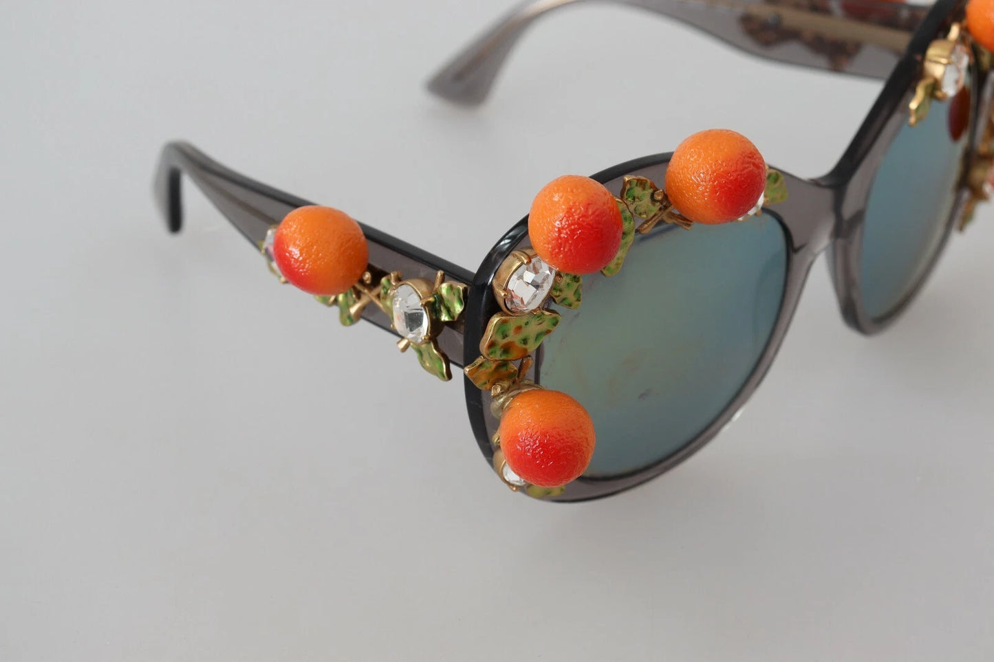 Lunettes de soleil Dolce & Gabbana DG4283B en acétate avec cristaux et appliqués orange.