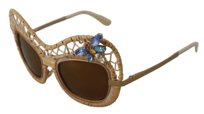 Lunettes de soleil Dolce & Gabbana DG2159B beige doré, forme papillon, avec strass.