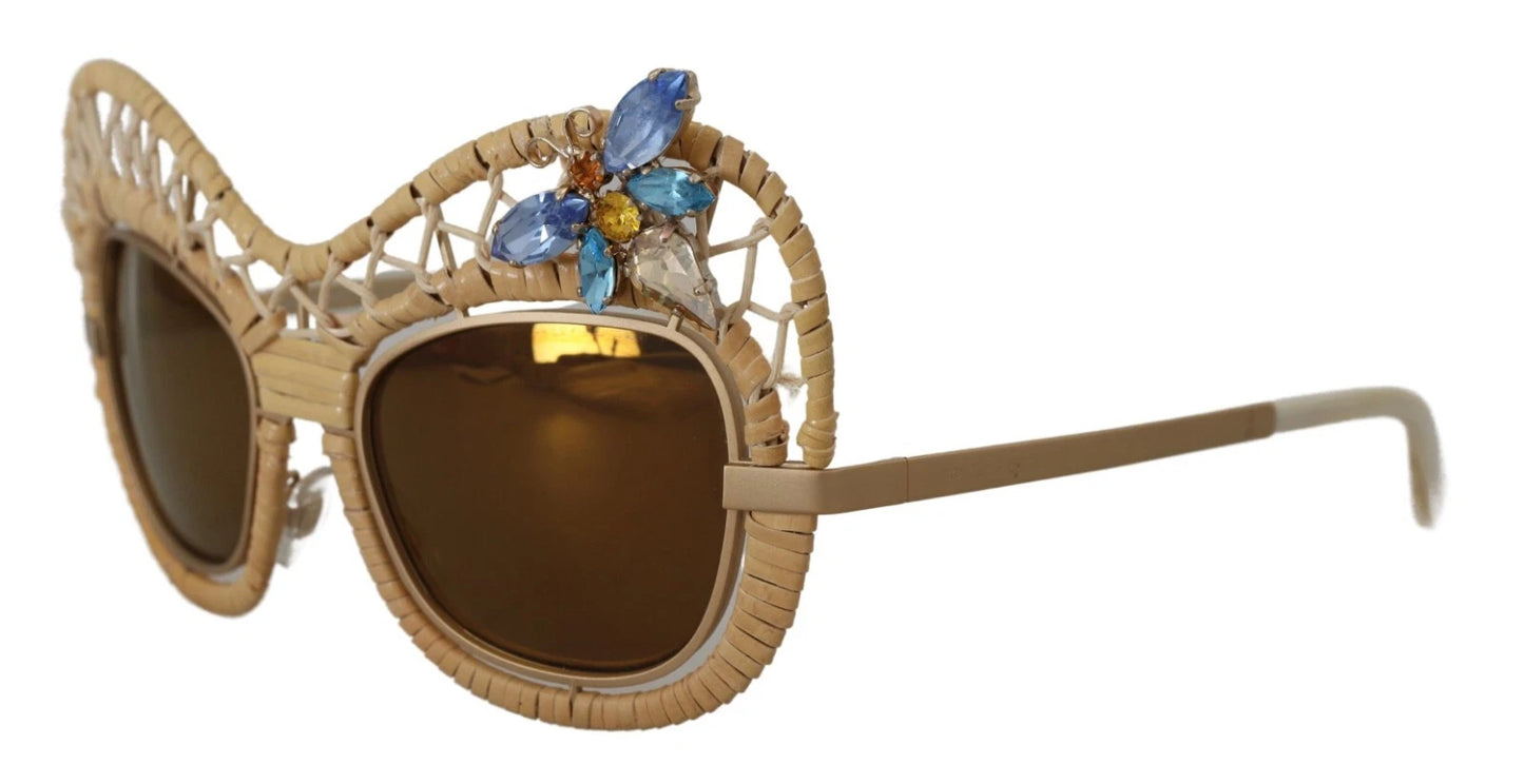Lunettes de soleil Dolce & Gabbana DG2159B beige doré, forme papillon, avec strass.
