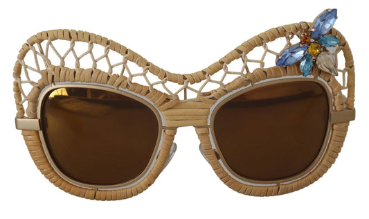Lunettes de soleil Dolce & Gabbana DG2159B beige doré, forme papillon, avec strass.