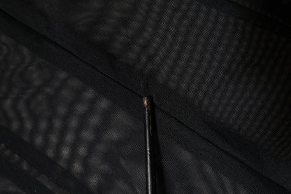 Combinaison-body en maille transparente à manches longues noire de Dolce & Gabbana