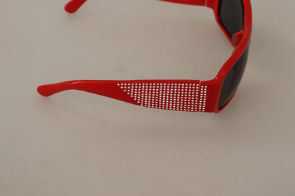 Lunettes de soleil Dolce & Gabbana DG4027, monture rouge cristal, verres noirs.