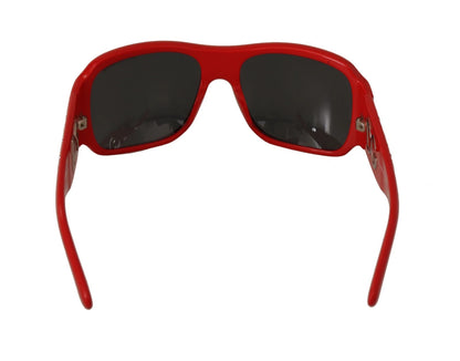 Lunettes de soleil Dolce & Gabbana DG4027, monture rouge cristal, verres noirs.
