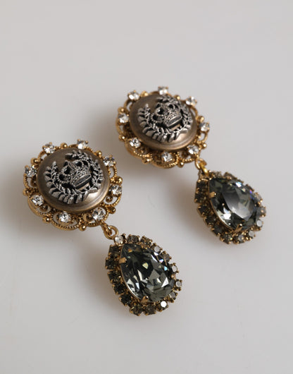 Boucles d'oreilles clips en forme de couronne et médaillon en laiton doré et cristaux noirs de Dolce &amp; Gabbana.