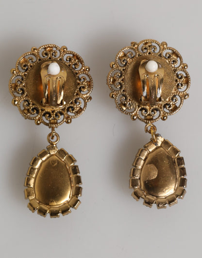 Boucles d'oreilles clips en forme de couronne et médaillon en laiton doré et cristaux noirs de Dolce &amp; Gabbana.