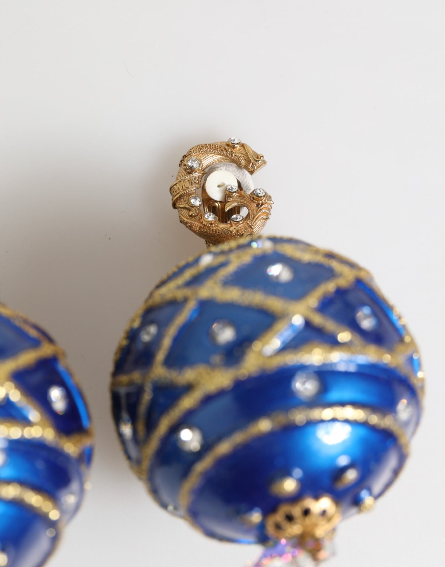 Boucles d'oreilles clips en laiton doré et cristal bleu en forme de boule de Noël de Dolce &amp; Gabbana