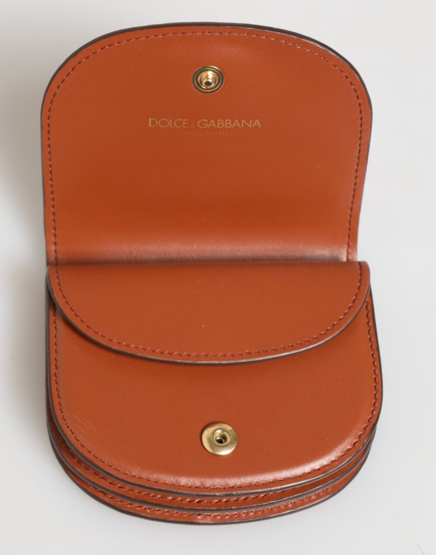 Portefeuille Dolce &amp; Gabbana en cuir de veau marron et noir avec imprimé léopard et plaque logo.