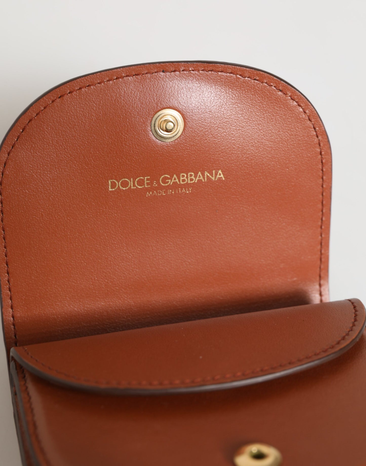 Portefeuille Dolce &amp; Gabbana en cuir de veau marron et noir avec imprimé léopard et plaque logo.