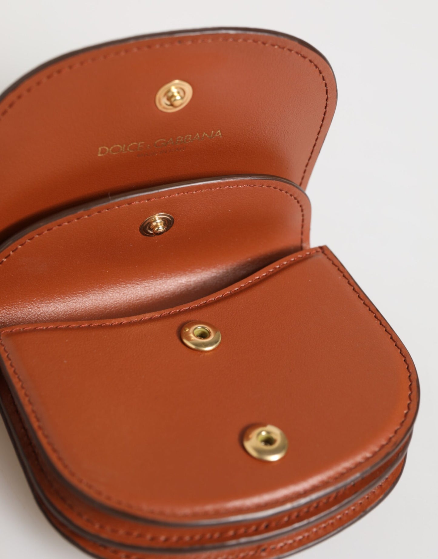 Portefeuille Dolce &amp; Gabbana en cuir de veau marron et noir avec imprimé léopard et plaque logo.