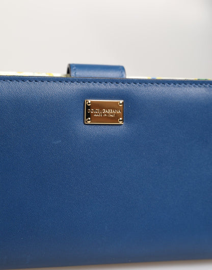 Portefeuille à rabat en cuir bleu Dolce &amp; Gabbana avec imprimé de carreaux et fermeture éclair.