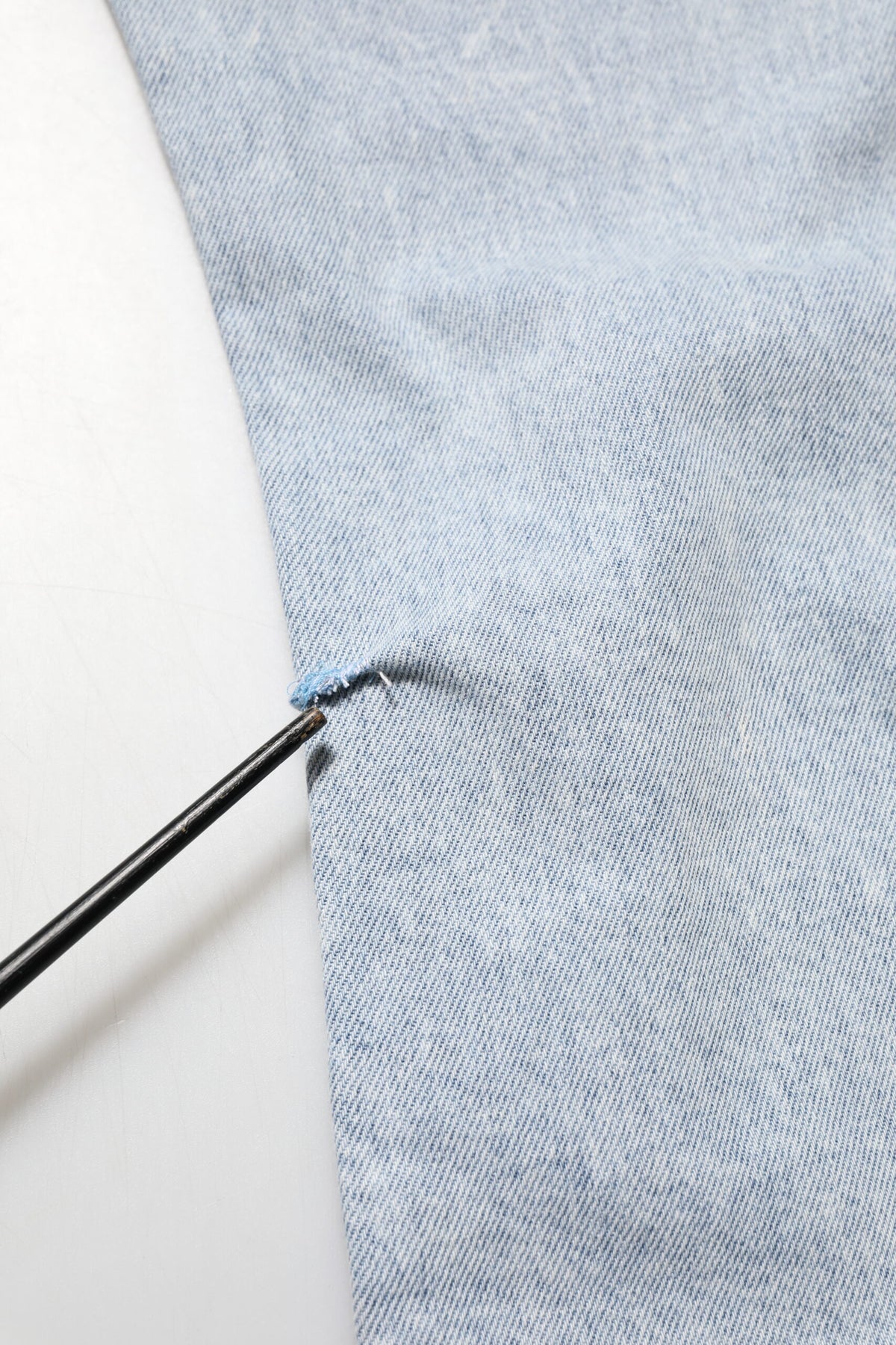 Jean Dolce &amp; Gabbana bleu clair délavé, coupe slim et déchiré