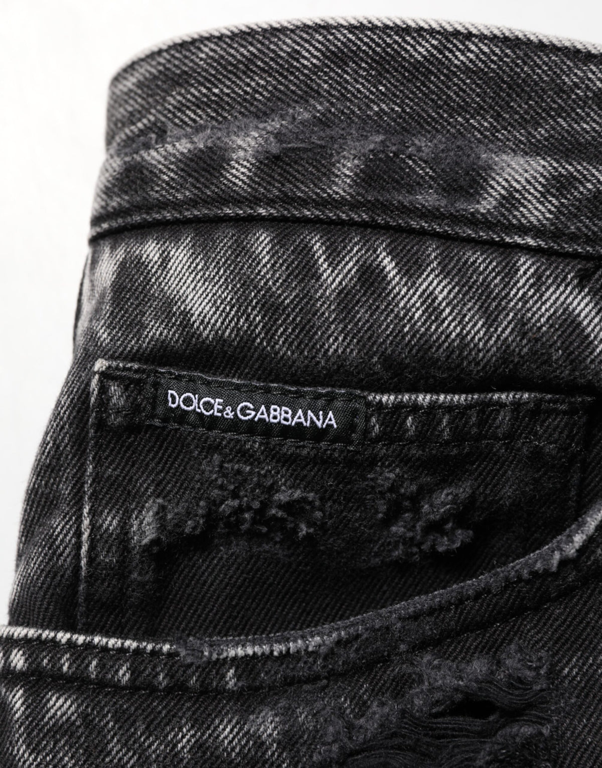 Jean en denim de coton noir délavé et déchiré Dolce &amp; Gabbana