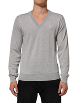 Pull en laine grise à col en V avec logo de Dolce &amp; Gabbana