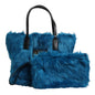 Sac à main porté épaule Dolce &amp; Gabbana bleu en fourrure avec plaque logo et double poignée.