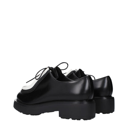 Prada, souliers Oxford et mocassins en cuir noir