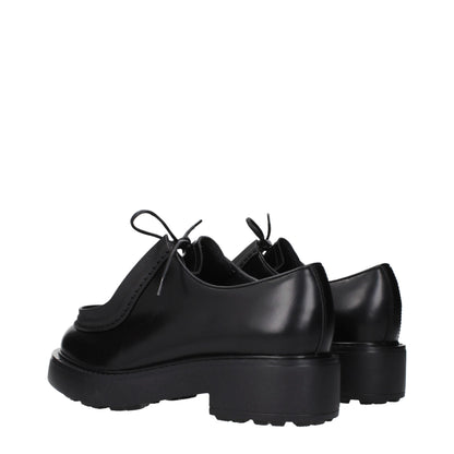 Prada, souliers Oxford et mocassins en cuir noir
