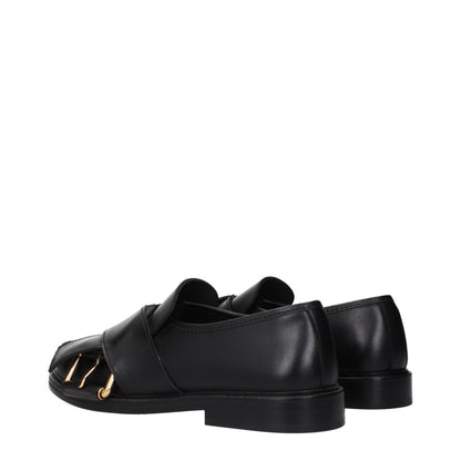 Brogues plates en cuir noir Moschino