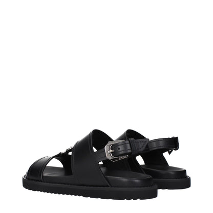 Sandales plates en cuir noir Versace