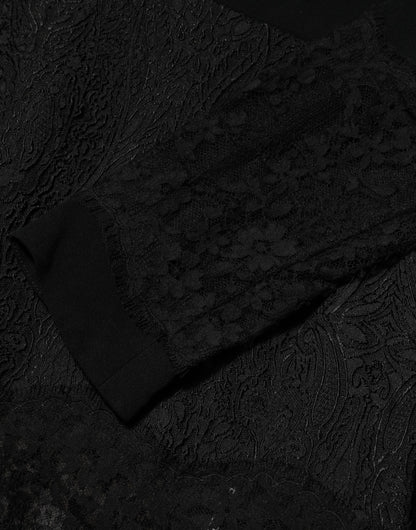 Dolce &amp; Gabbana zwarte, A-lijn jurk met bloemrijke kant en kantrand.