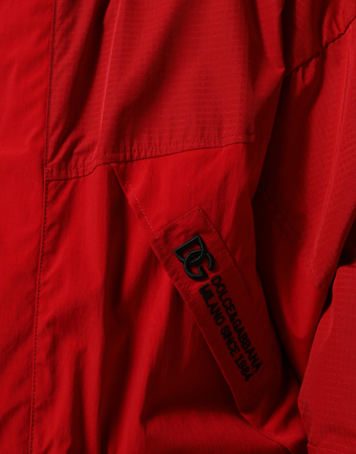 Parka à capuche zippée en nylon rouge pour homme de Dolce & Gabbana