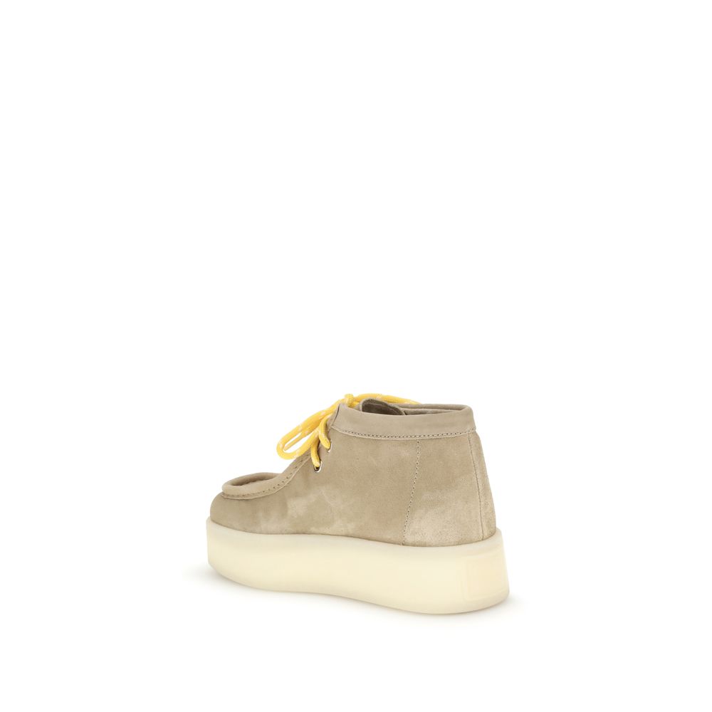 Bottes plates en cuir Miu Miu