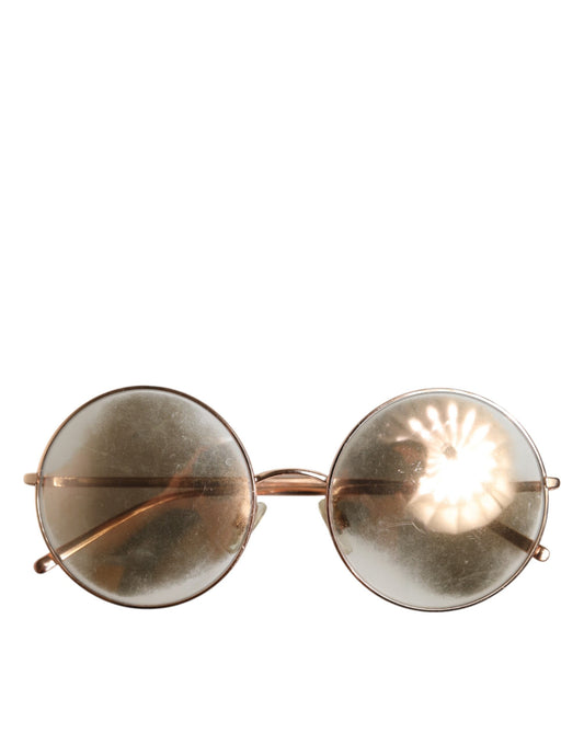 Lunettes de soleil Dolce &amp; Gabbana à verres ronds et monture plaquée or rose.