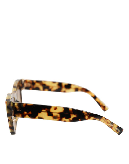 Lunettes de soleil Dolce &amp; Gabbana DG4379F en acétate blanc effet écaille de tortue dégradé.