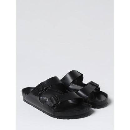 Sandales plates Birkenstock noires en EVA