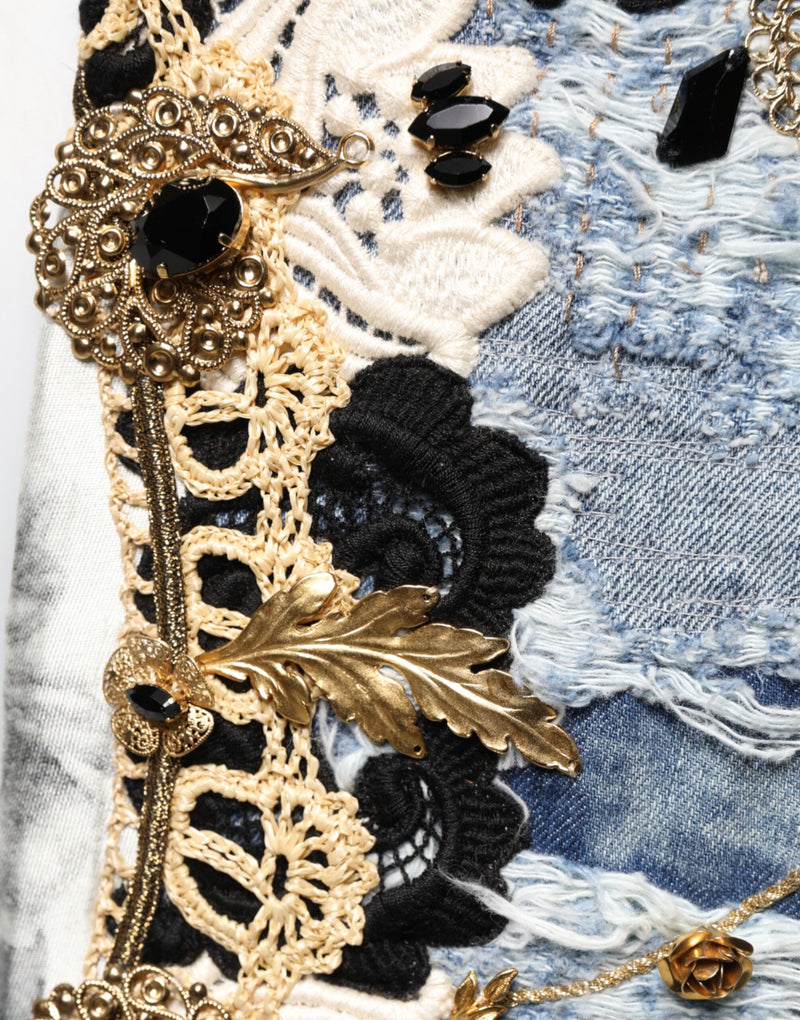 Jean en denim de coton bleu déchiré et orné Dolce &amp; Gabbana