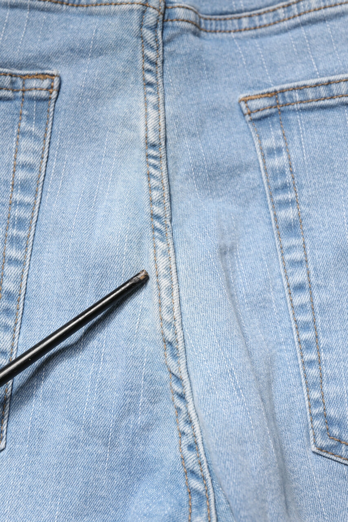 Jean en denim bleu clair Twister taille mi-haute coupe skinny pour homme