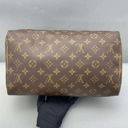 Sac à main d'occasion en cuir Louis Vuitton Speedy - bon état - Chakmar Luxe