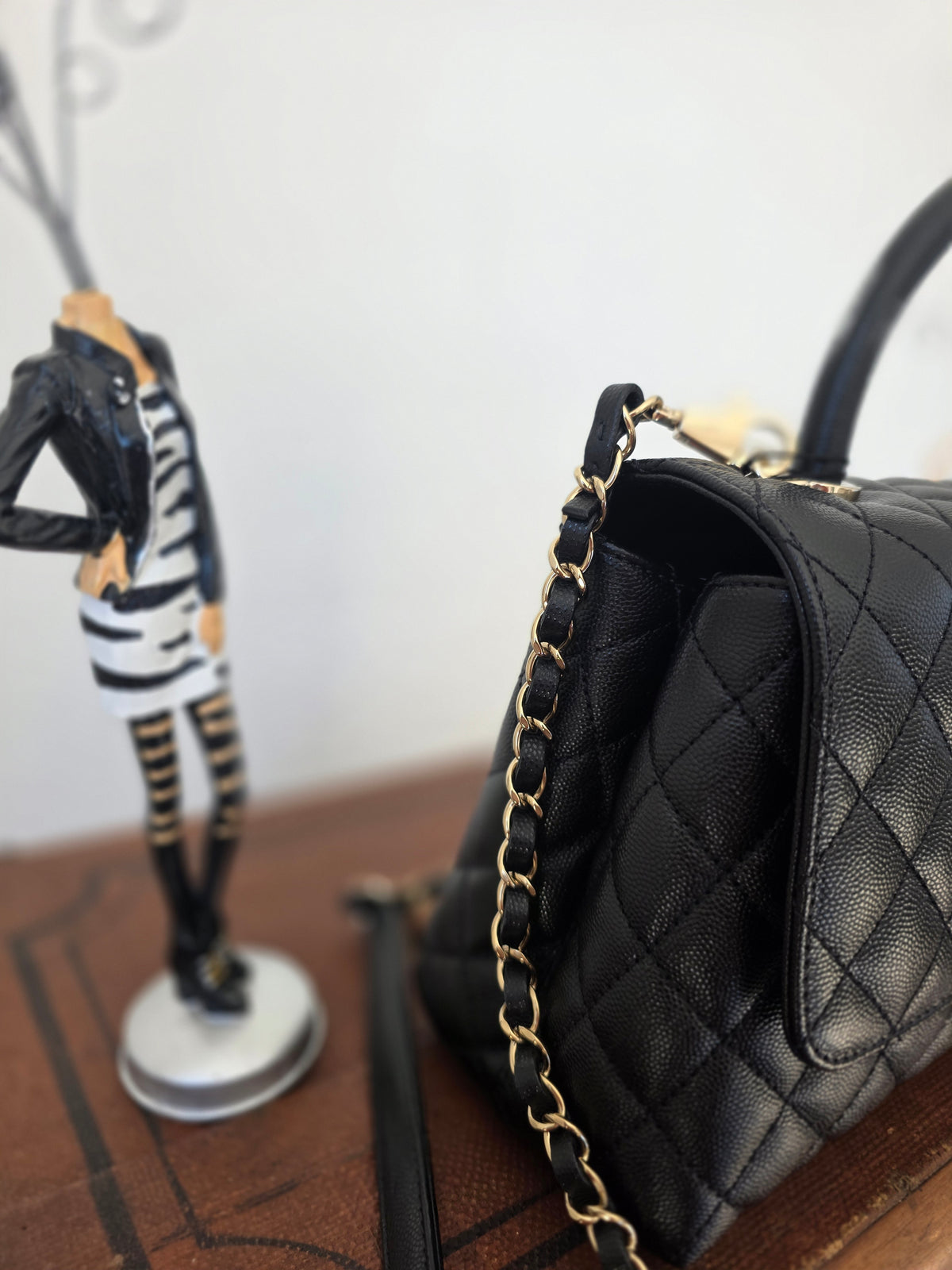 Chanel Handle Handle Handle Bag in black quilted grained leather
